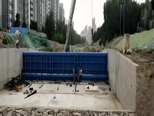 弧形钢坝闸工作原理全解析:液压驱动与弧形结构的协同优势